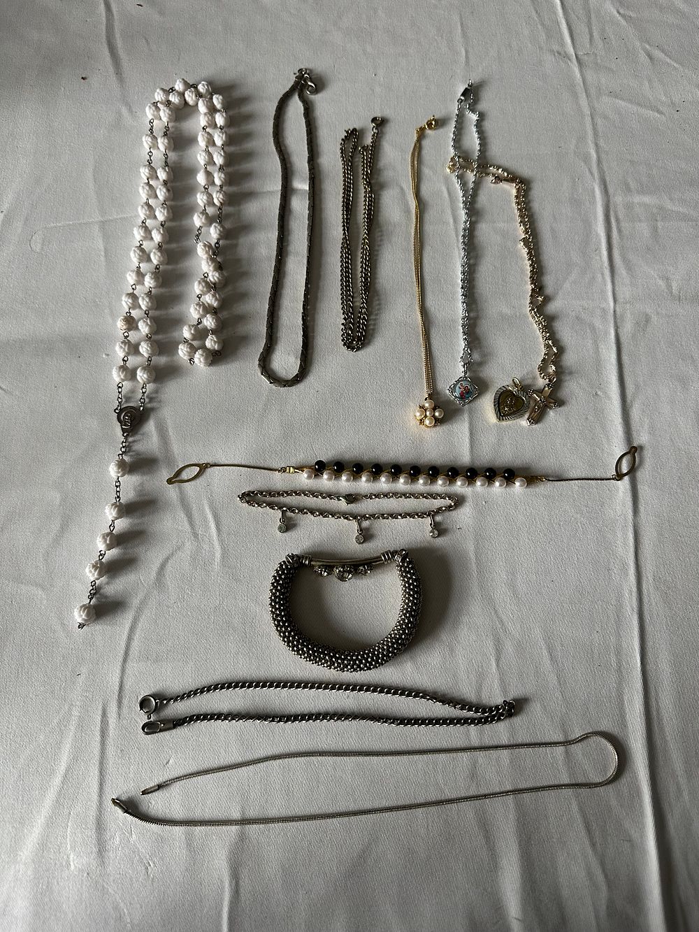 Lot 306: Mixed lot of bracelets and necklaces as pictured.