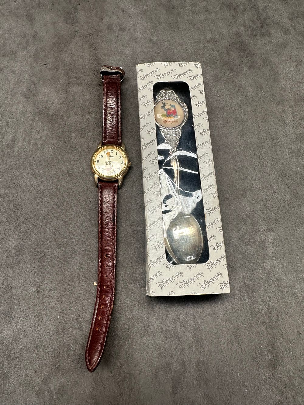 Lot 344: Disney Spoon & Disney watch with brown leather strap.