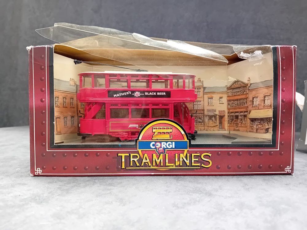 Lot 205: Pair of damaged box corgi transport vehicles as pictured. Rare Corgi Tramlines #C992/1 and Corgi Classics Bedford OB Coach.