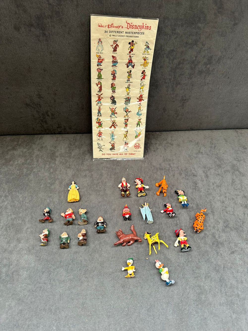 Lot 565: Walt Disney’s Disneykins Figurines Collection with Original Display...