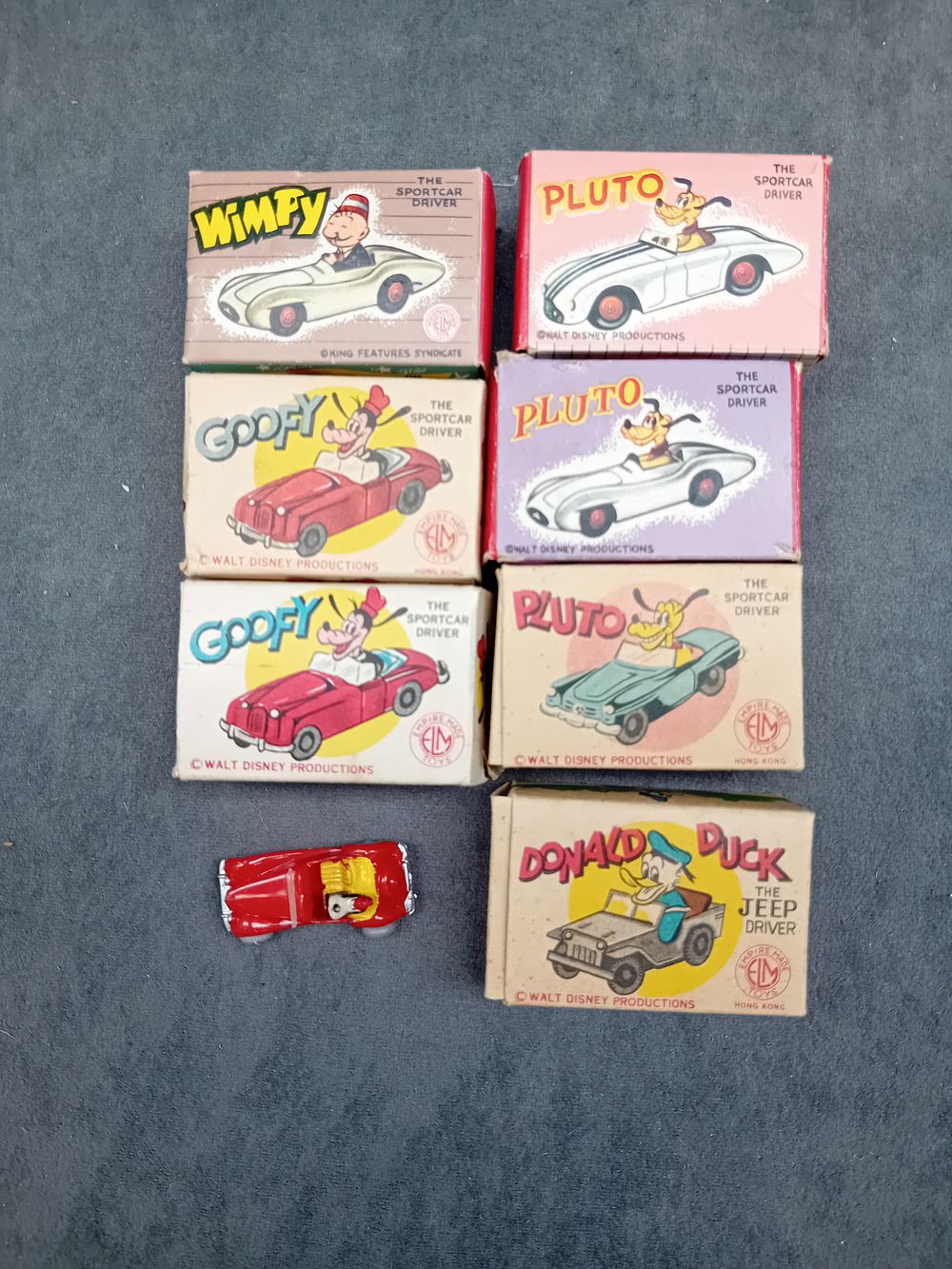 Lot 569: Empire made Disney miniature cars with 1 unboxed

this lot includes Pluto sports car drive x 3 Goofey x3 and 1 unboxed, donald duck jeep driver and wimpy