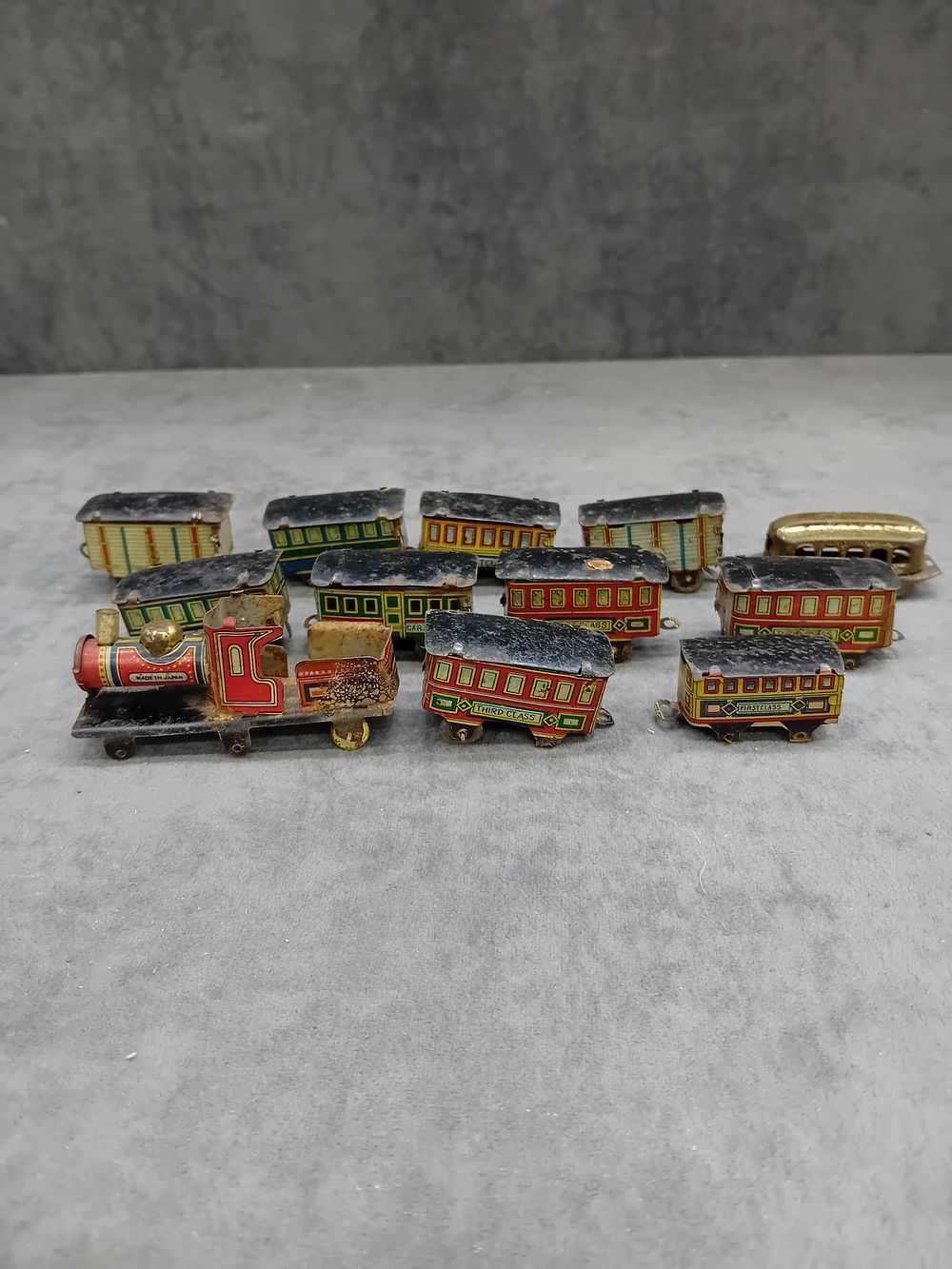 Lot 489: Rare Penny Toy Train Set, includes 5 x...