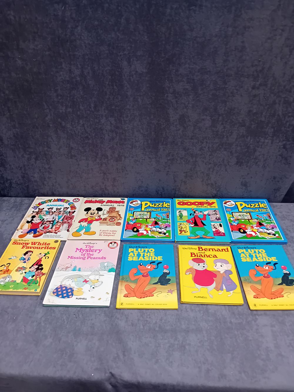 Lot 615: LOT OF TEN WALT DISNEY ANNUALS AND BOOKS...