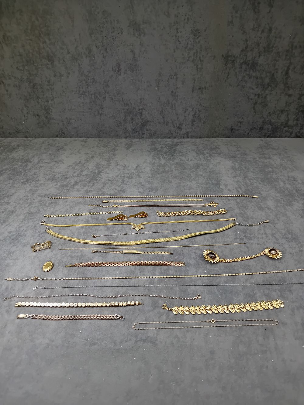 Lot 210: Mixed Lot Of Gold Coloured Jewelry Mainly Necklaces...