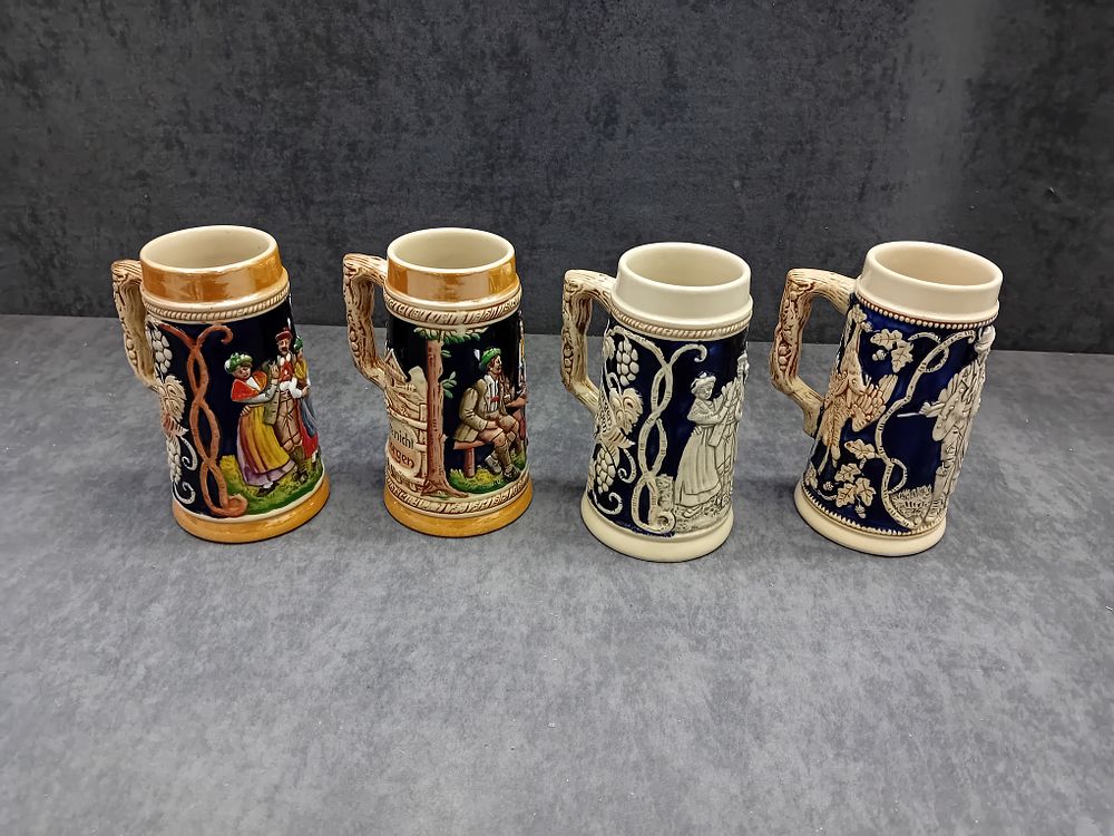 Lot 253: Set of 4 Vintage German Beer Steins -...