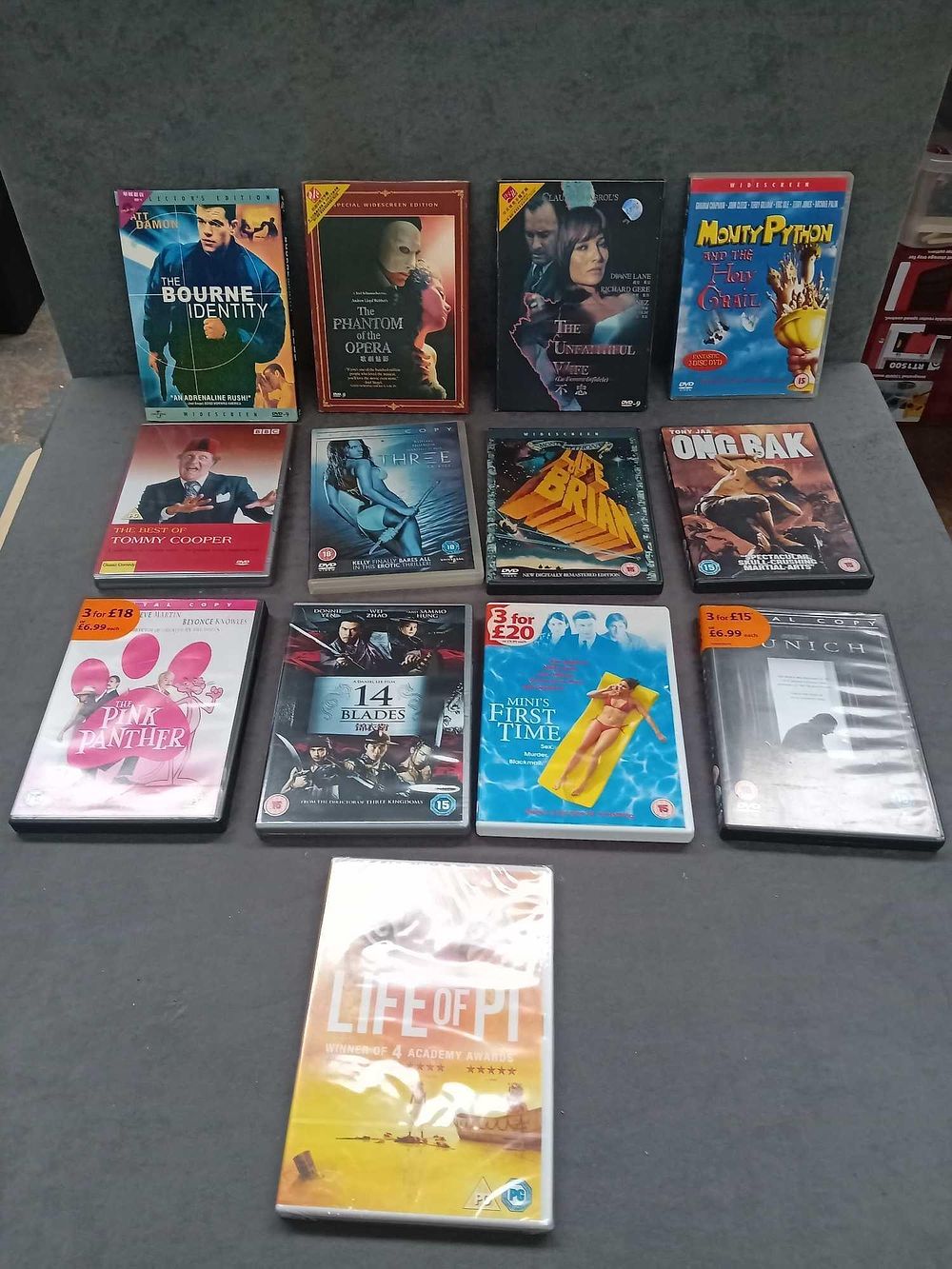 Lot 327: Mixed lot of 13 dvd one unopen with...