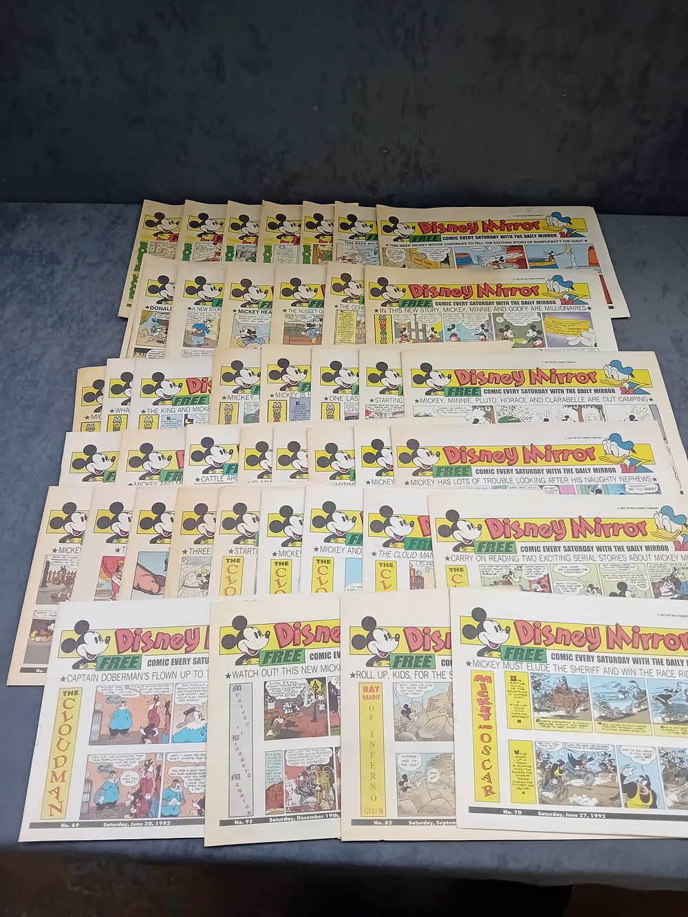 Lot 212: Large mixed lot of disney news papers 44...