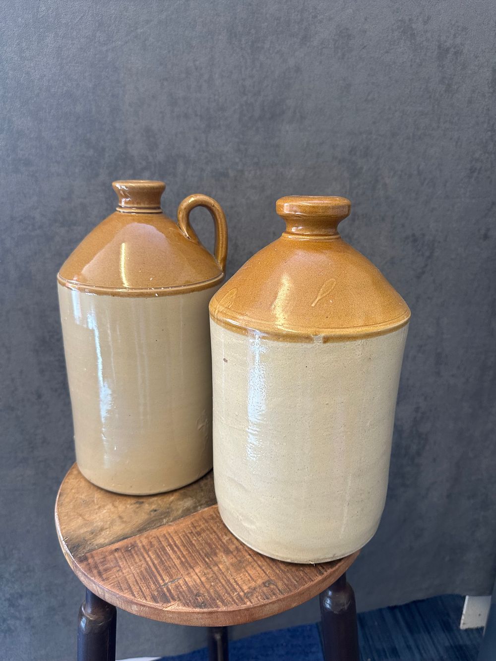 Lot 311: A set of 2/19 century stoneware jugs one...