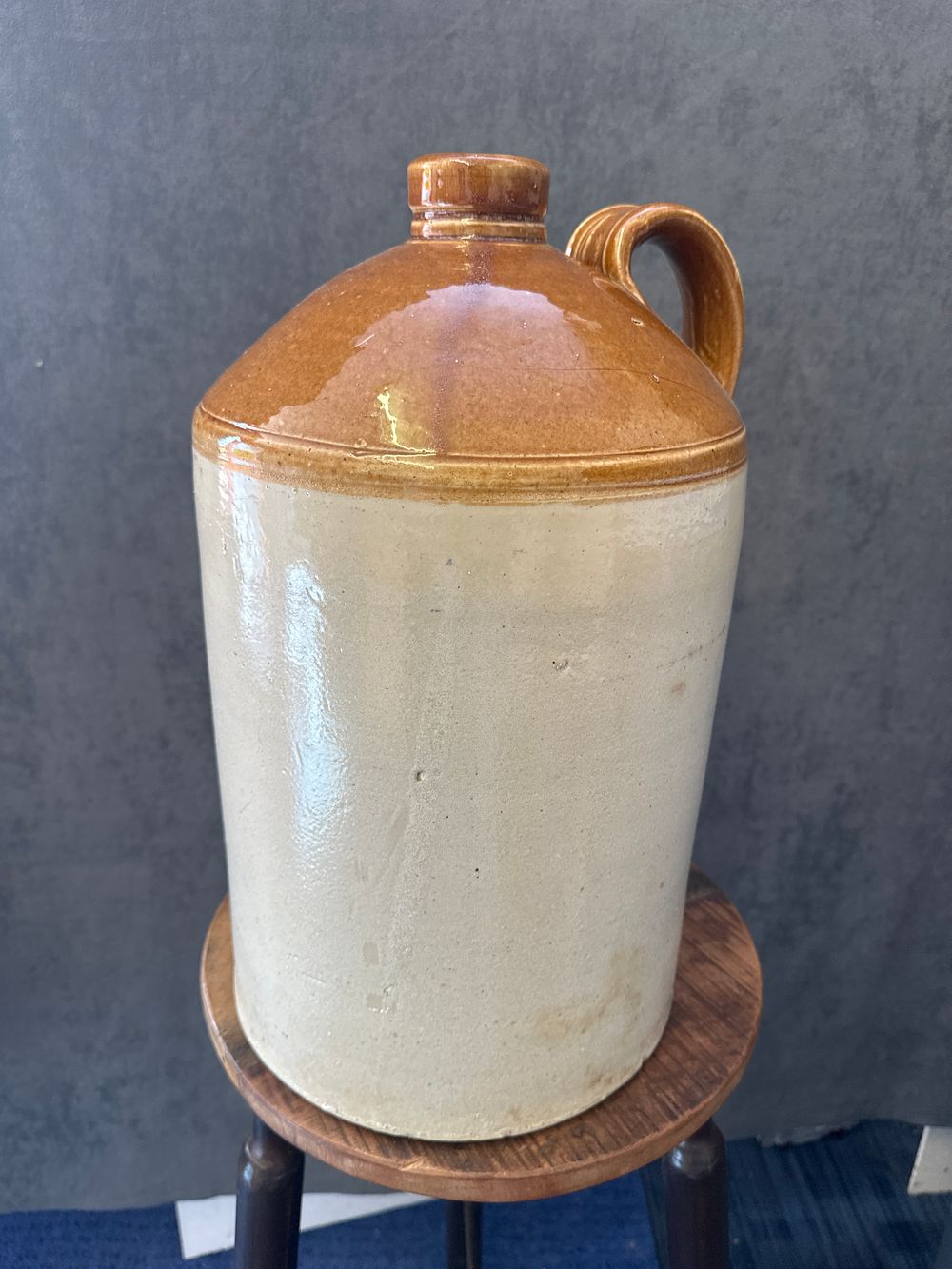 Lot 312: A massive stoneware jug from the 19th century...