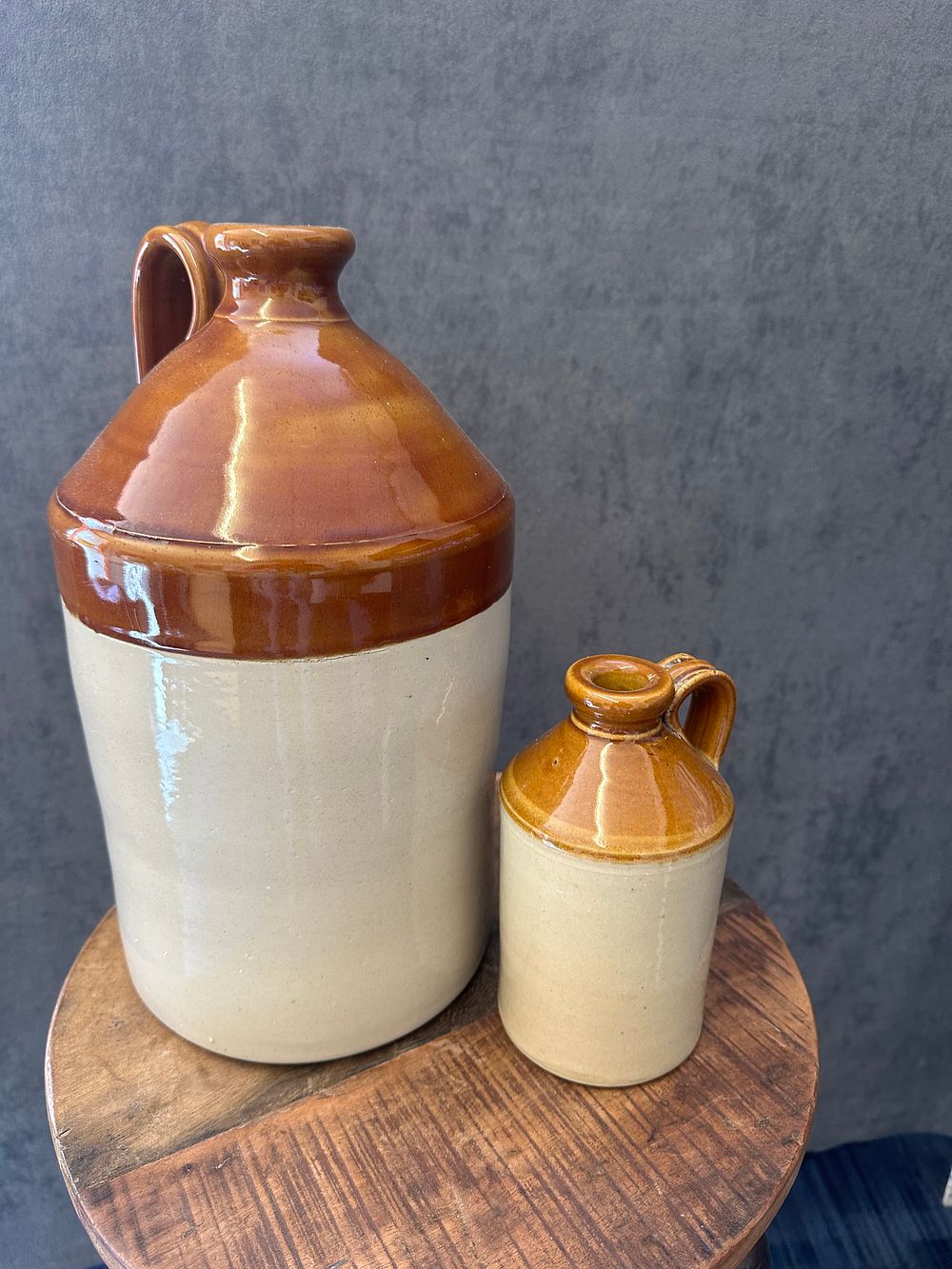 Lot 313: Set of Three 19th century stoneware jugs, one...
