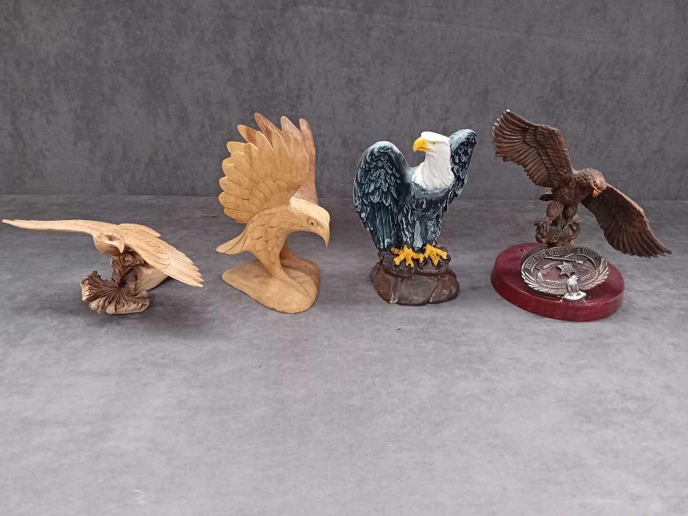 Lot 551: Mixed lot of four eagles two wooden and...