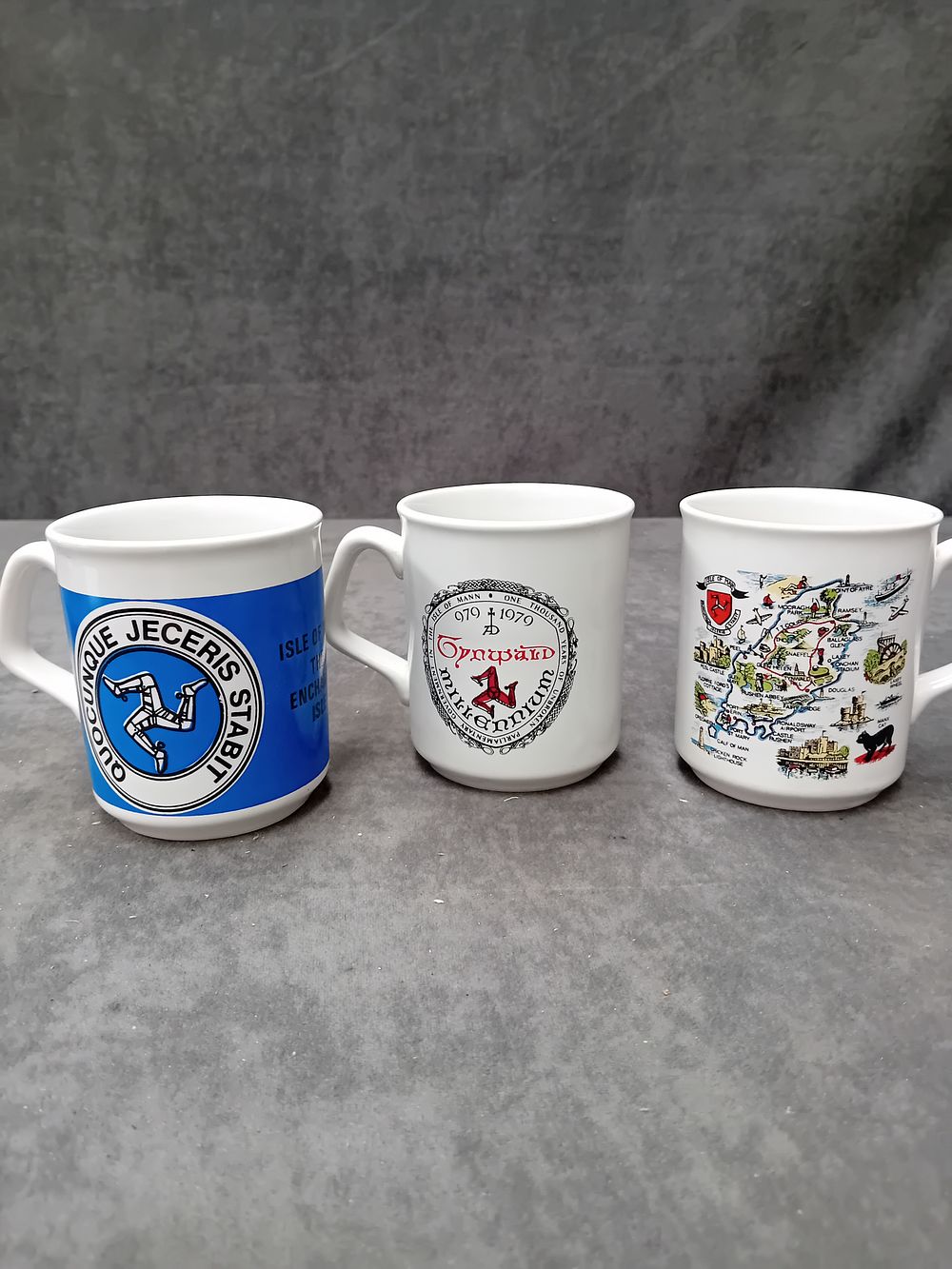Lot 689: 3 x Isle of man mugs as pictured