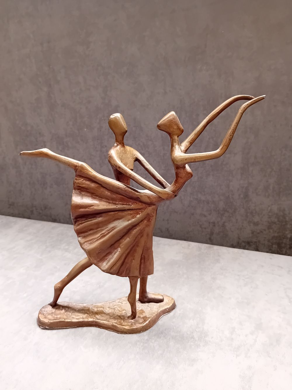Lot 233: Metal Ornament of dancers as pictured 