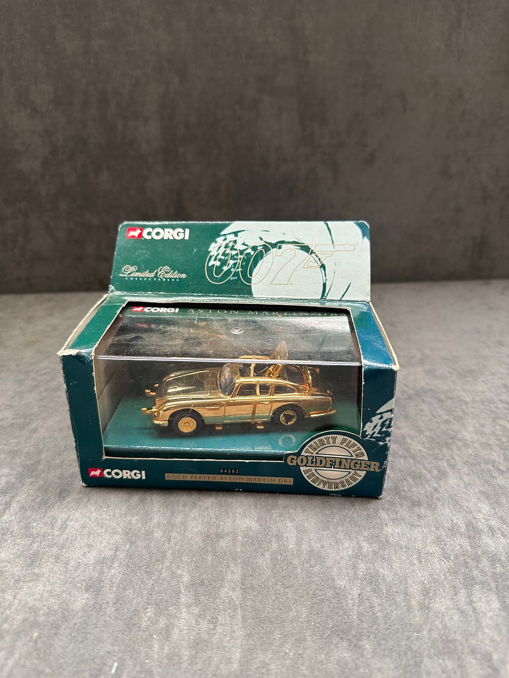 Lot 472: Corgi 007 Limited Edition Gold Plated Aston Martin...