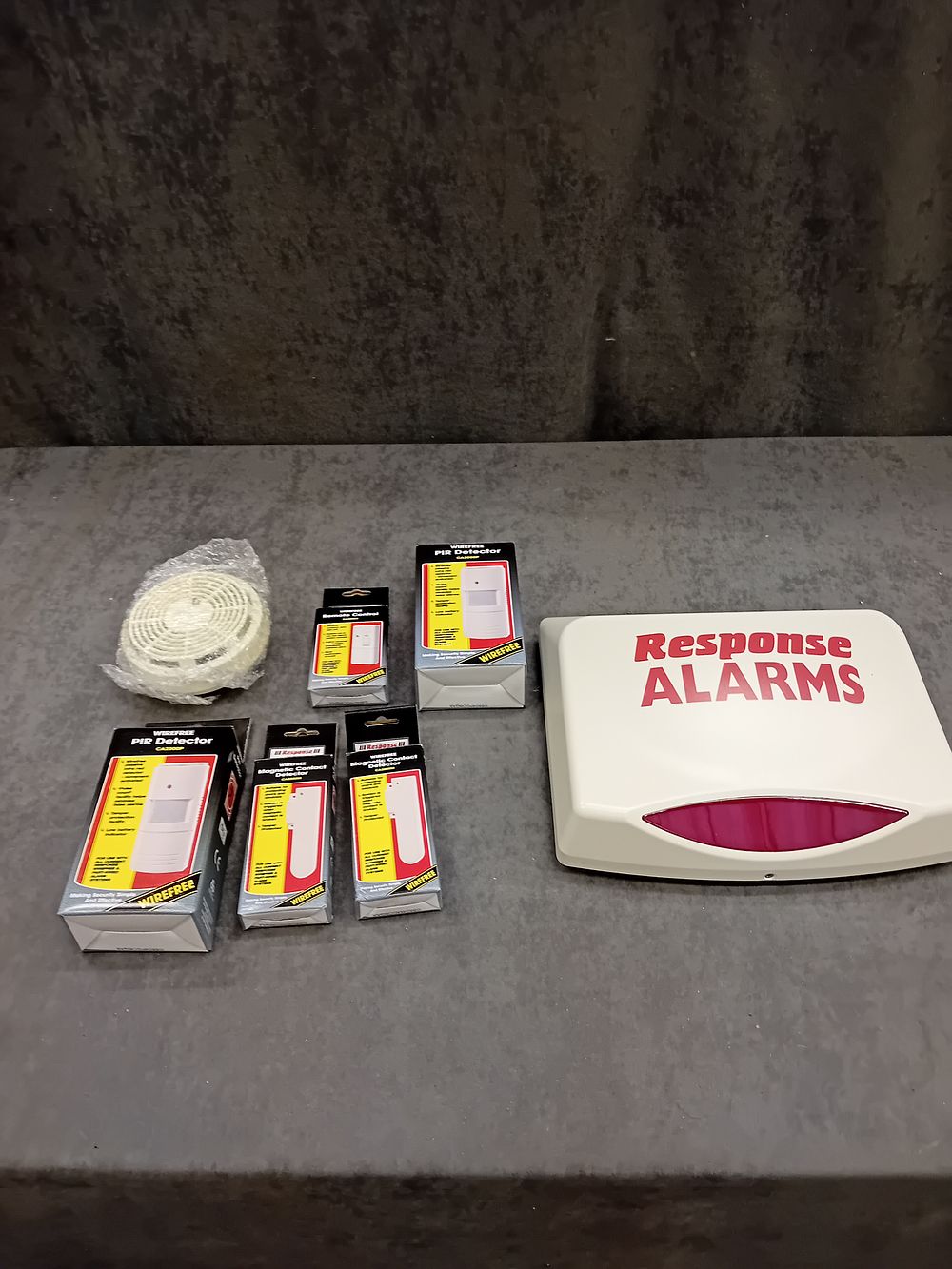 Lot 210: Response alarms house security system with accessories as...