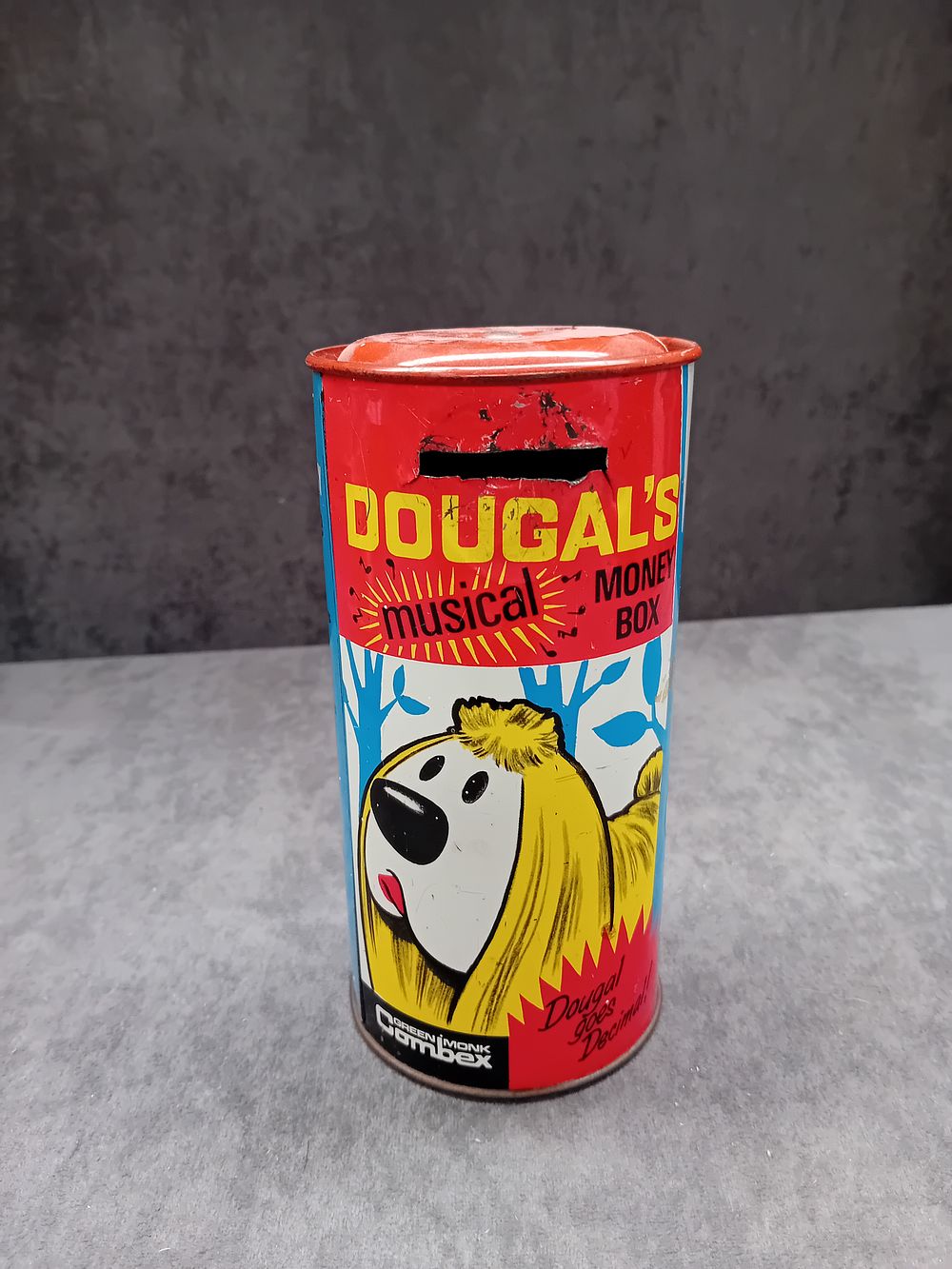 Lot 412: a 1960s Dougals musical money box as pictured