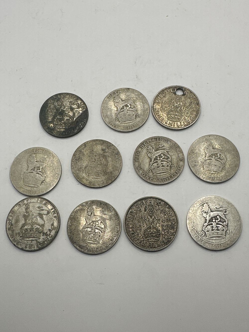 Lot 327: Great Britain King George V Silver Shillings, Various Dates (Lot of 11)