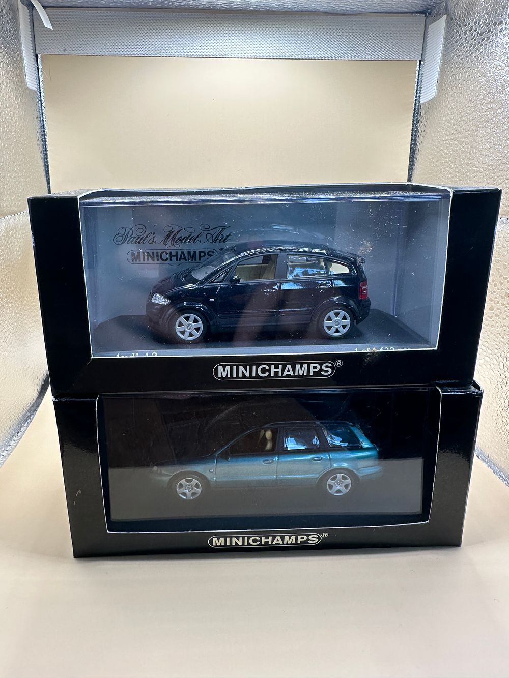 Lot 39: Two Paul's Model Art Minichamps Diecast Audi A2 and A4 Avant Model Cars