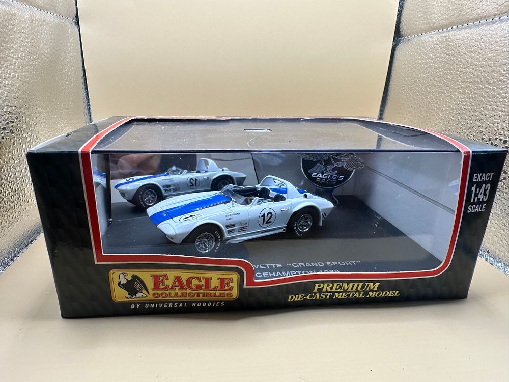 Lot 70: A Pair of Eagle Collectibles by Universal Hobbies 1:43 Scale Die-Cast Chevrolet Corvette 'Grand Sport' Models, Bridgehampton 1966