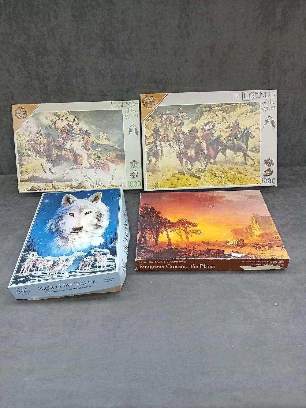 Lot 242: 4 jigsaw puzzles unchecked and open as pictured