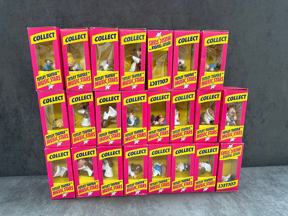 Lot 651: A Collection of 23 Boxed Tetley Tea Folk Music Stars Figurines