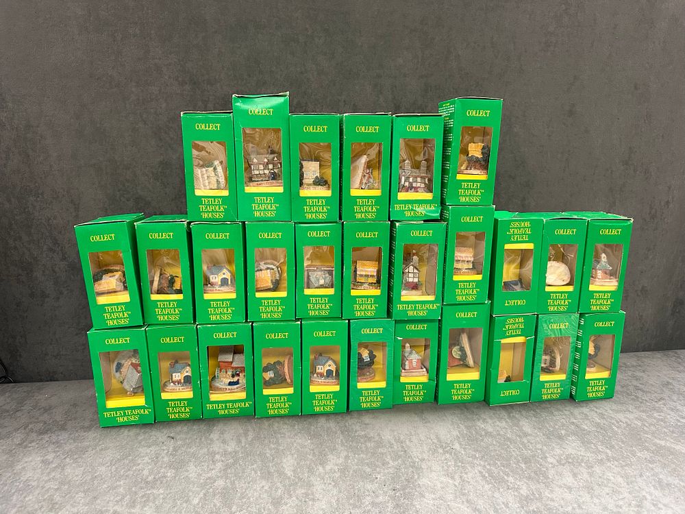 Lot 654: A Collection of 28 Tetley Teafolk Collectable Houses