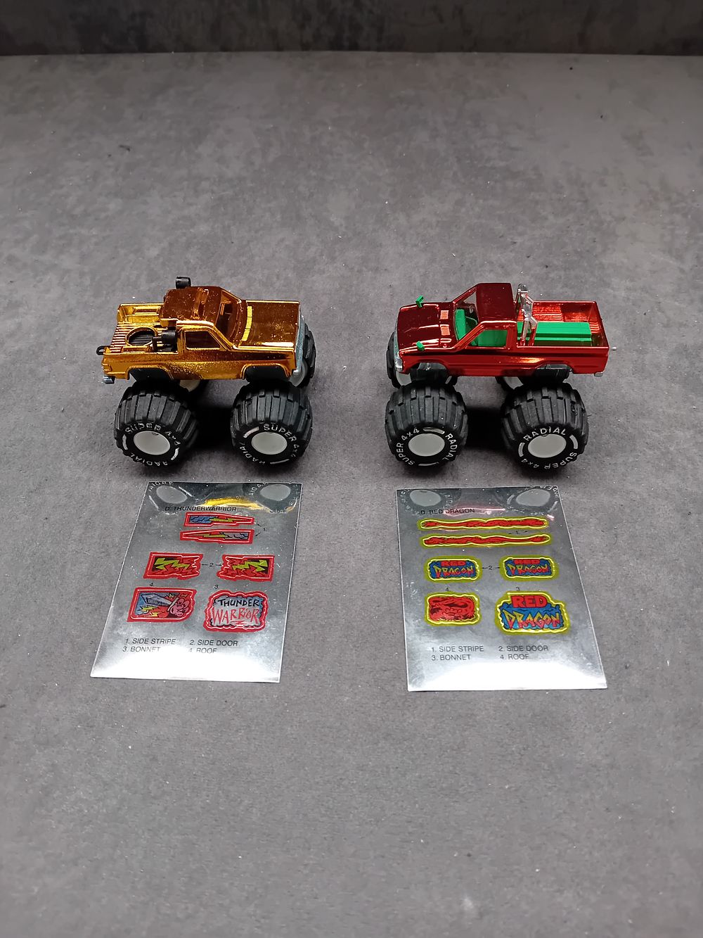 Lot 152: A Pair of Majorette Die-Cast Monster Trucks: Toyota 'Red Dragon' and Blazer 'Thunder Warrior'