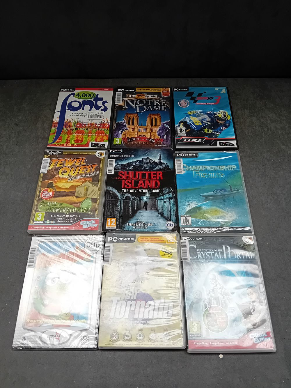 Lot 29: A Collection of 9 Sealed PC CD-ROM Games and Software Titles