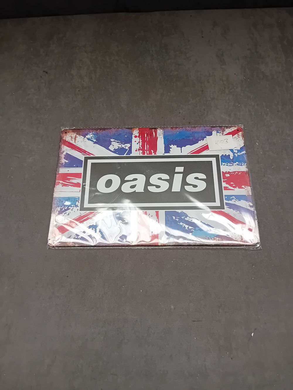 Lot 438: Trends International Oasis Union Jack Logo Metal Wall Art