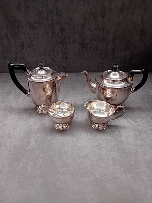 Garrard and Co Regent Plated Silver Coffee Set. tea and coffee pot, sugar bowl, tongs and a 