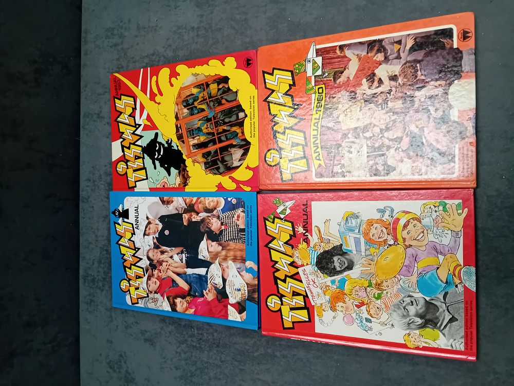Lot 514: TISWAS ANNUALS X 4 AS PICTURED&
