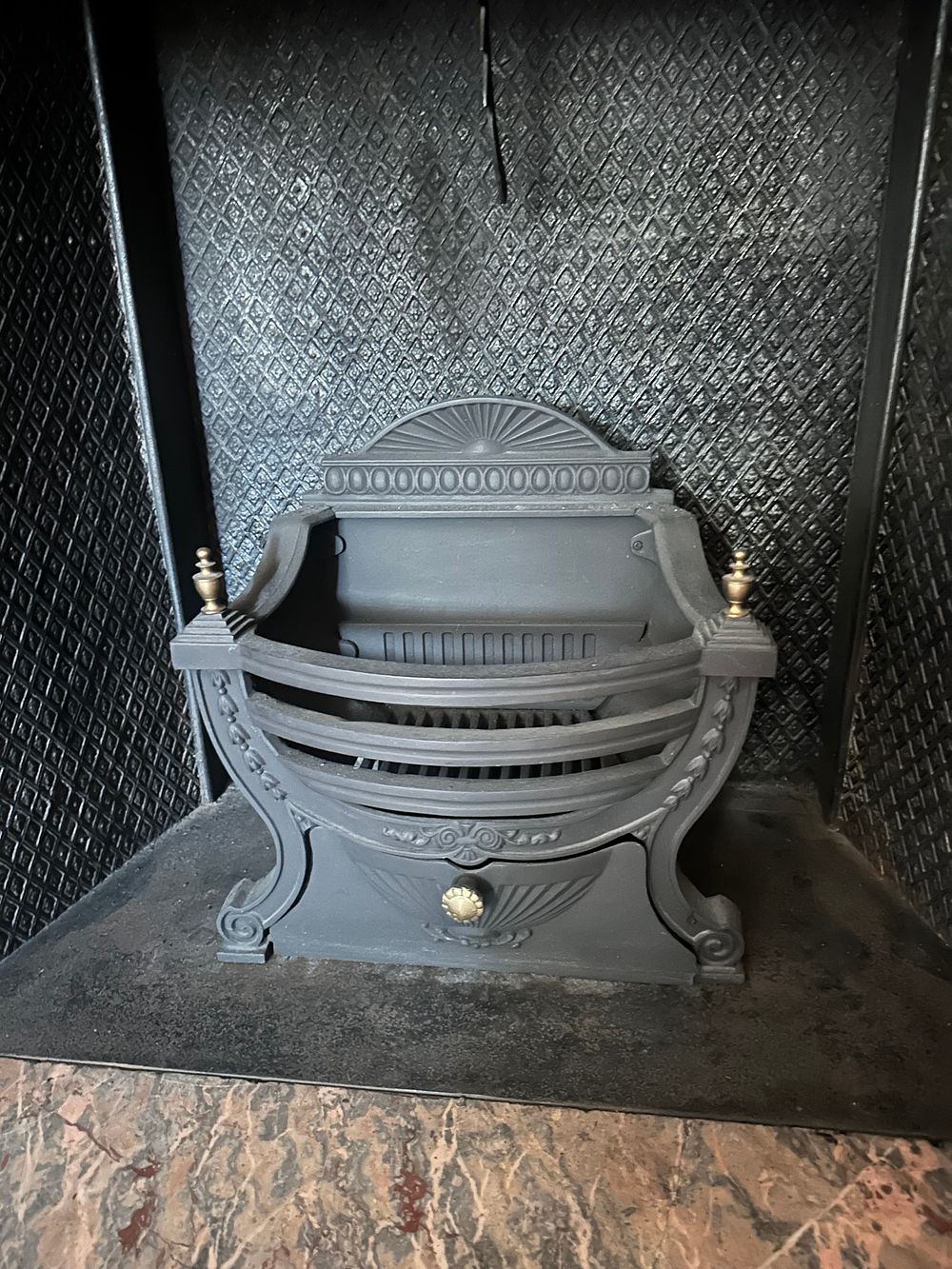 Lot 1005: A Victorian or Edwardian Neoclassical Revival Cast Iron Fire Grate