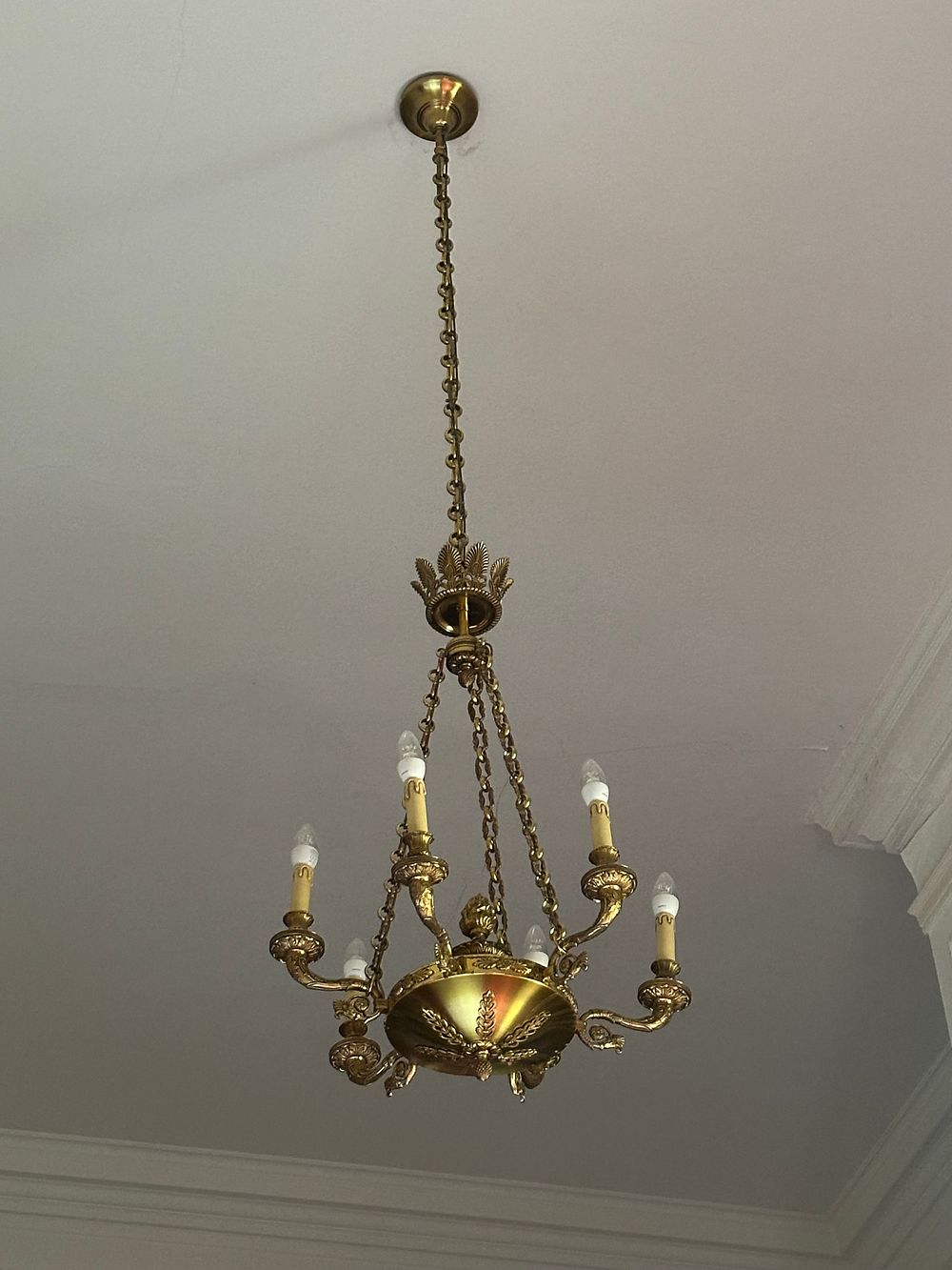 Lot 1014: A Late 19th Century French Empire Style Brass Six-Light Chandelier