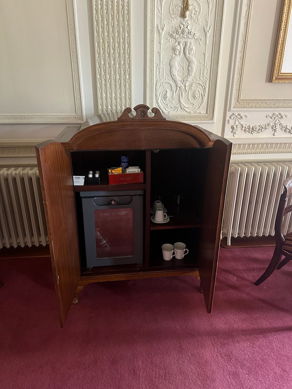 Lot 1016: A Traditional Style Carved Minibar Cabinet with Integrated Refrigerator