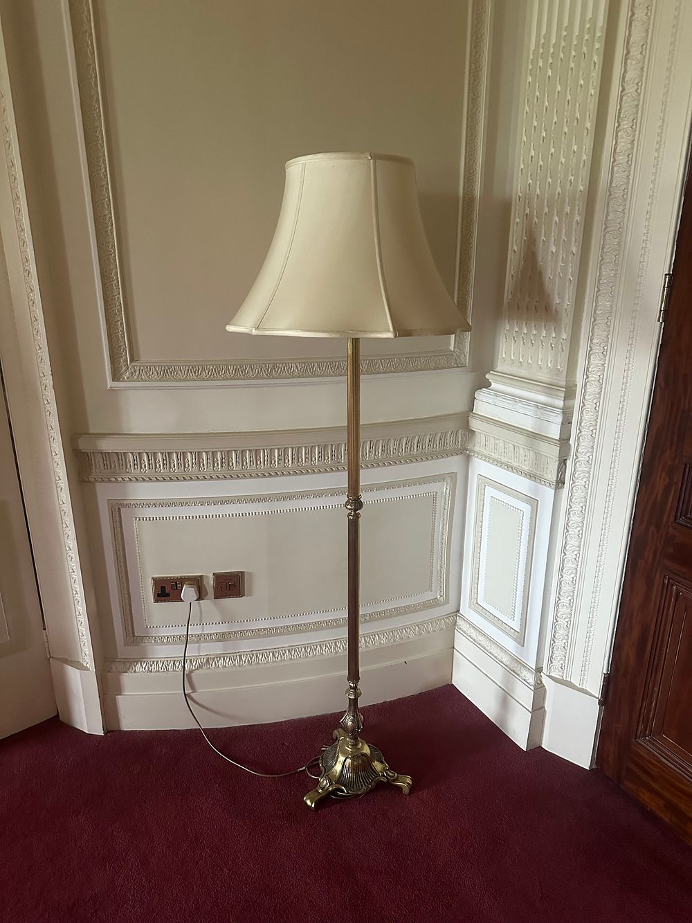 Lot 1022: A Hollywood Regency Style Brass and Patinated Metal Floor Lamp