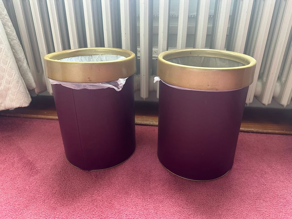 Lot 1025: A Pair of Contemporary Leather and Gold-Tone Metal Waste Bins
