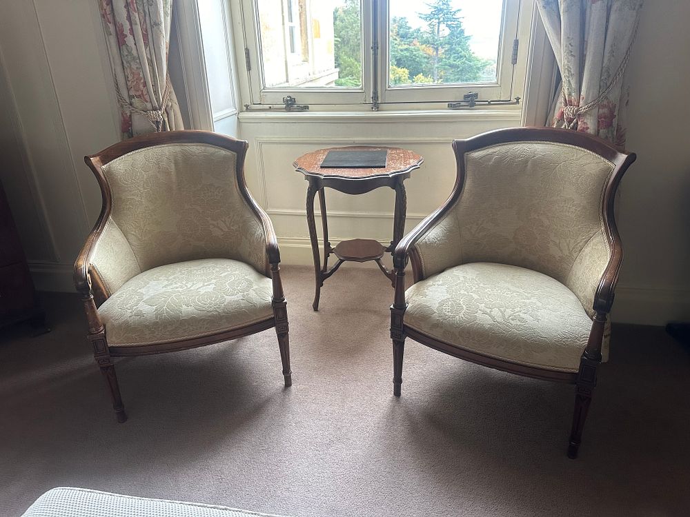 Lot 1052: A Pair of French Louis XVI Revival Armchairs and a Rococo Revival Side Table