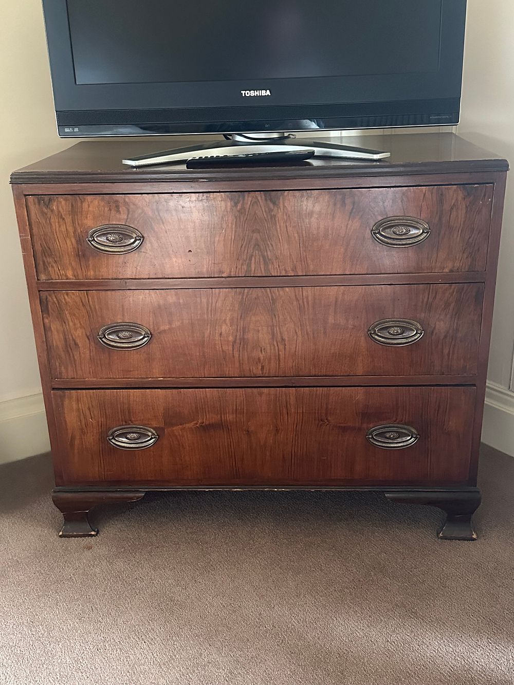 Lot 1054: An Early to Mid-20th Century Art Deco Style Veneered Burlwood Three-Drawer Chest