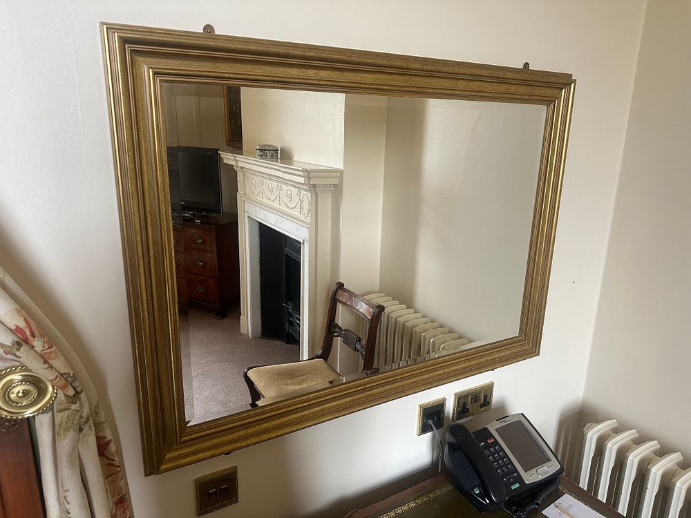 Lot 1056: A Regency Style Giltwood Wall Mirror