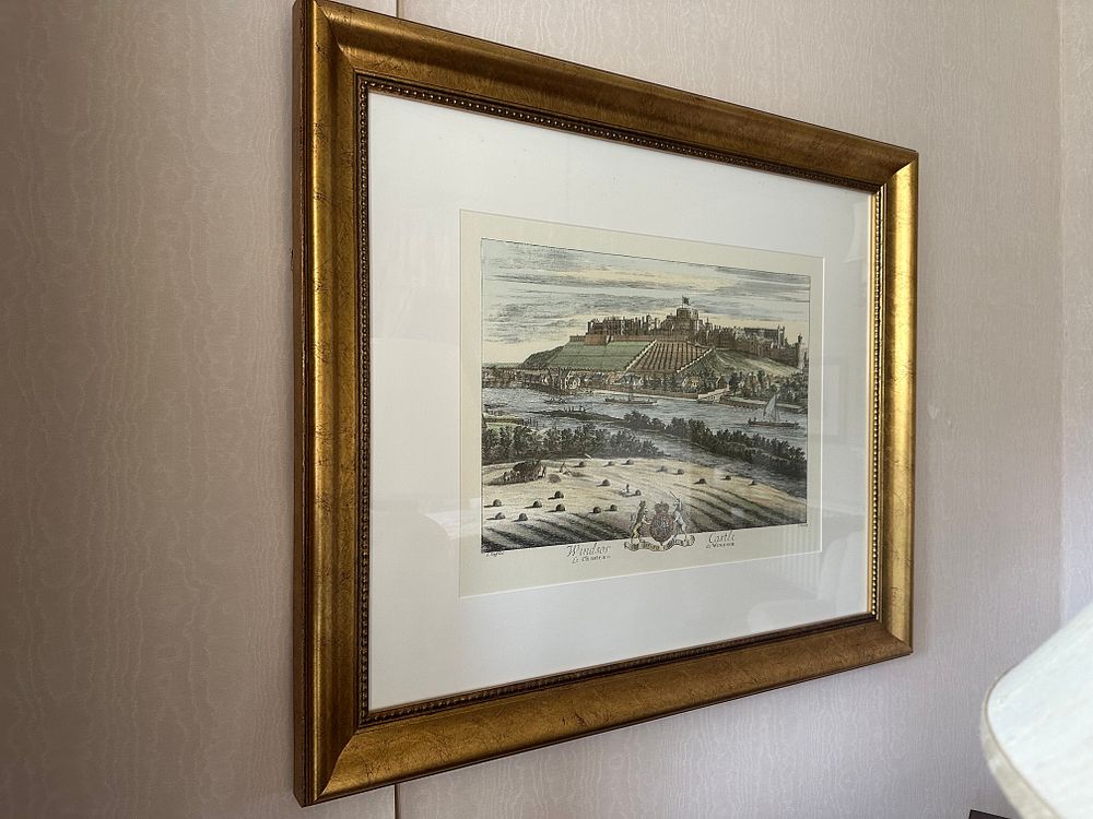 Lot 1064: A Pair of Hand-Colored Topographical Engravings, Late 17th/Early 18th Century, depicting Windsor Castle and Hampton Court Palace