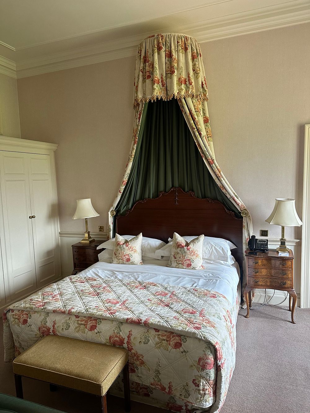 Lot 1080: A Rococo Revival Carved Hardwood Double Bed Headboard and Fabric Half-Tester Canopy