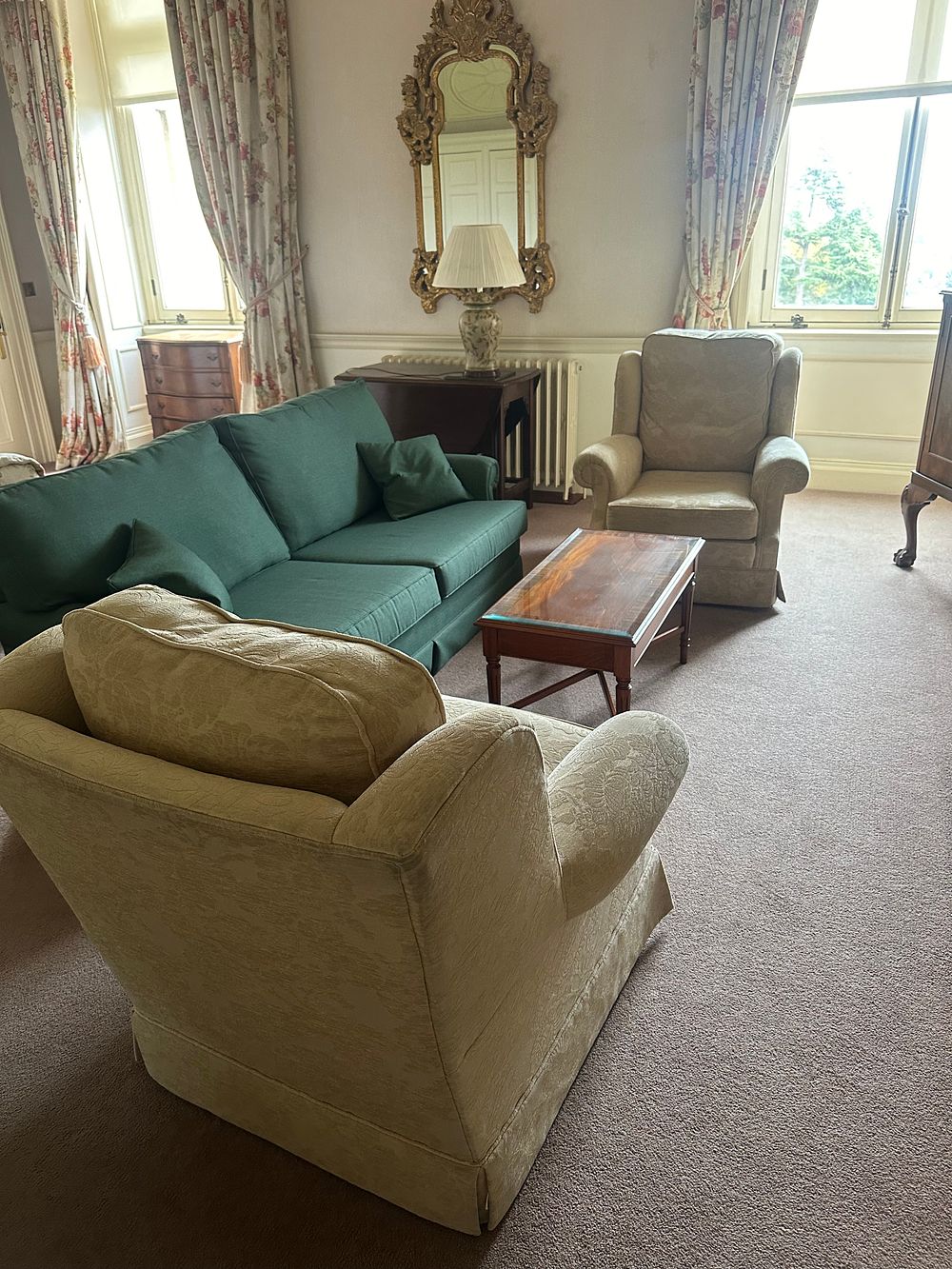 Lot 1083: A Pair of English Country Style Upholstered Armchairs