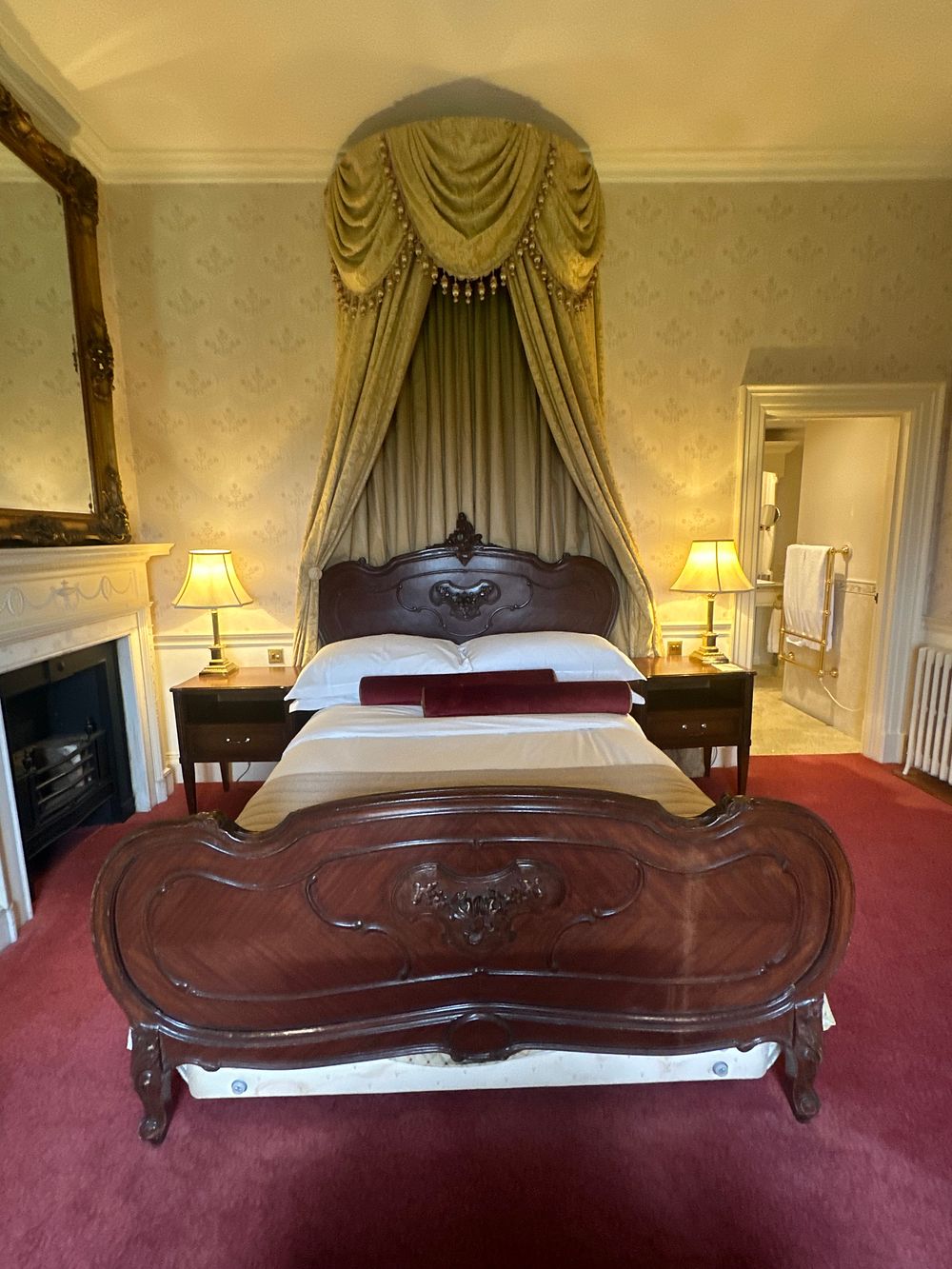 Lot 1116: A Rococo Revival Carved Bed Frame, suitable for a 150 cm x 200 cm mattress