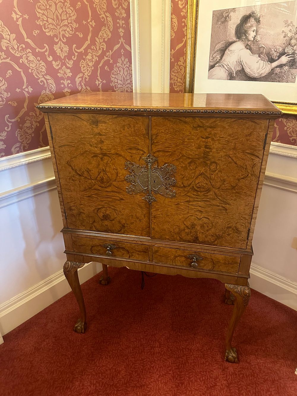 Lot 1132: A Burr Walnut Queen Anne Style Drinks Cabinet, with TV included