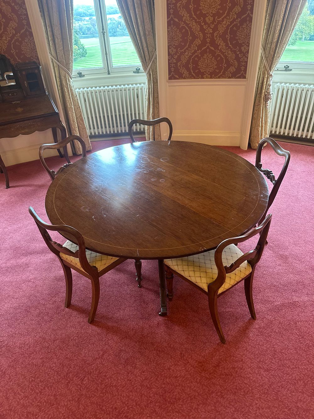 Lot 1141: A 19th Century Regency to Early Victorian Style Hardwood Dining Table and Five Chairs