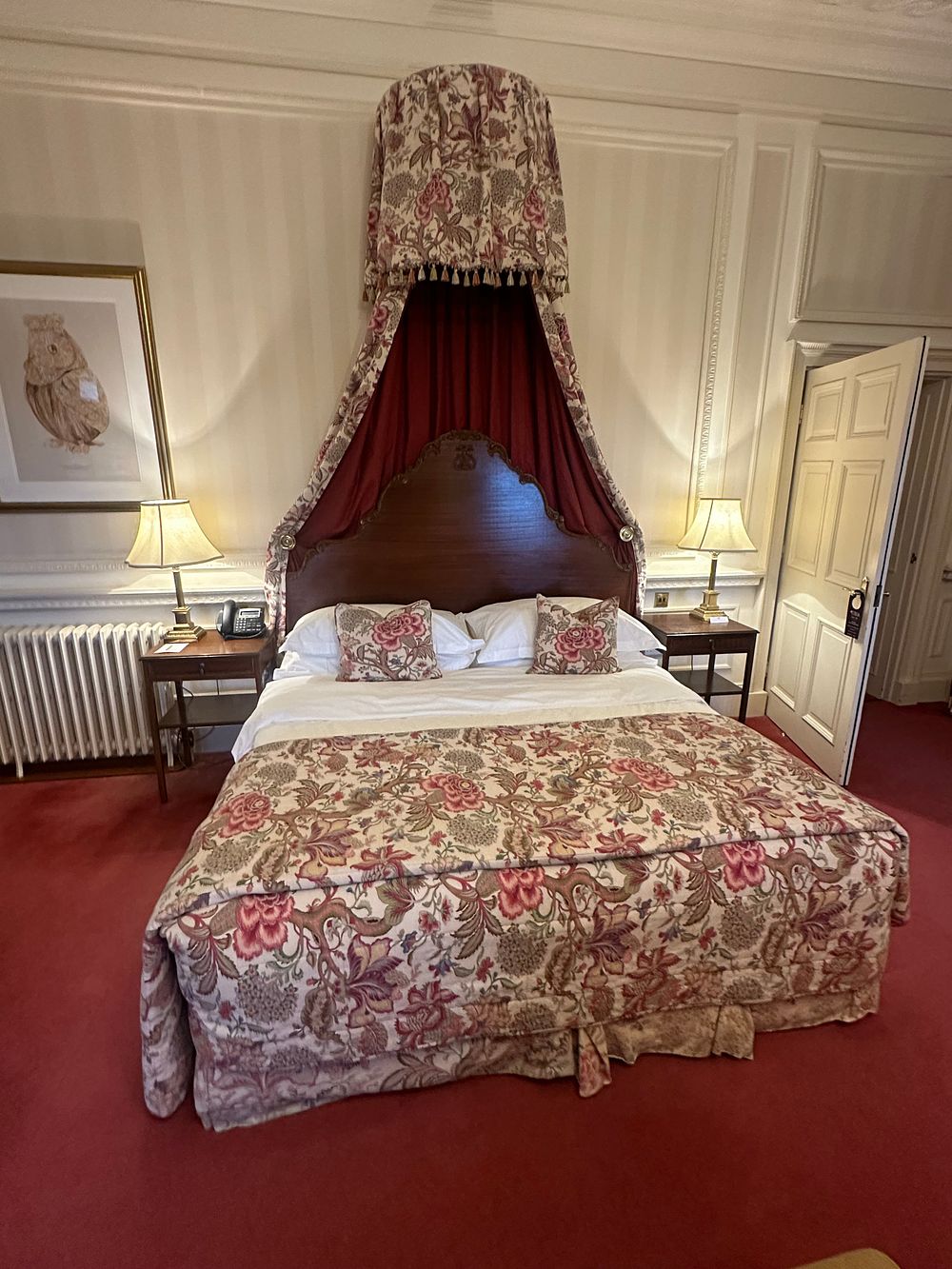 Lot 1184: A Georgian or Regency Revival Style Coronet Half-Tester Bed with Carved Hardwood Headboard and Fabric Pelmet