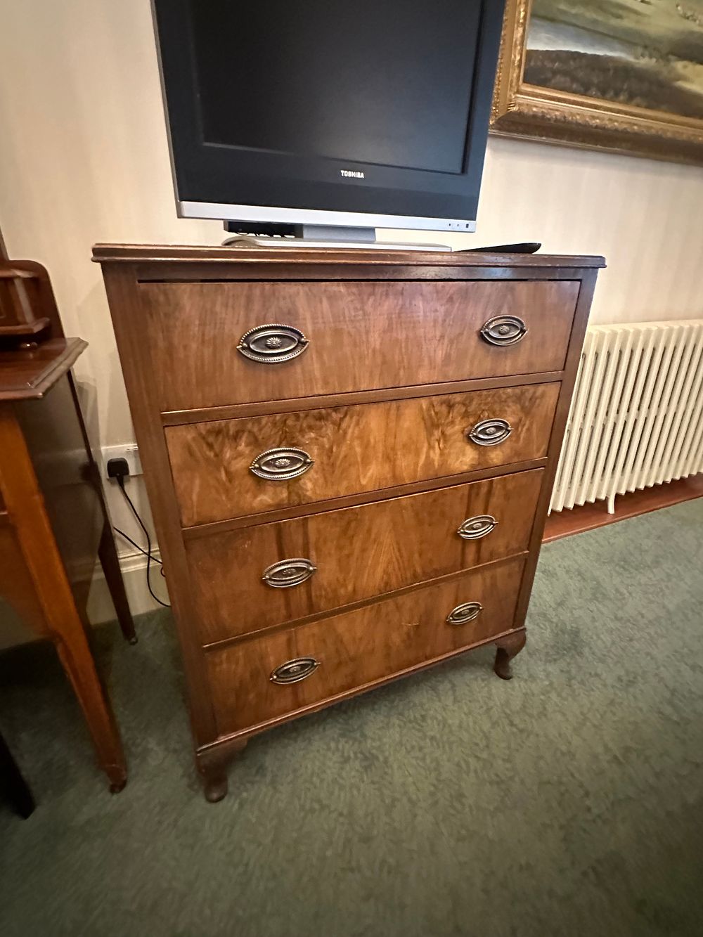 Lot 1206: An Early 20th Century Burr Walnut Veneered Four-Drawer Chest of Drawers