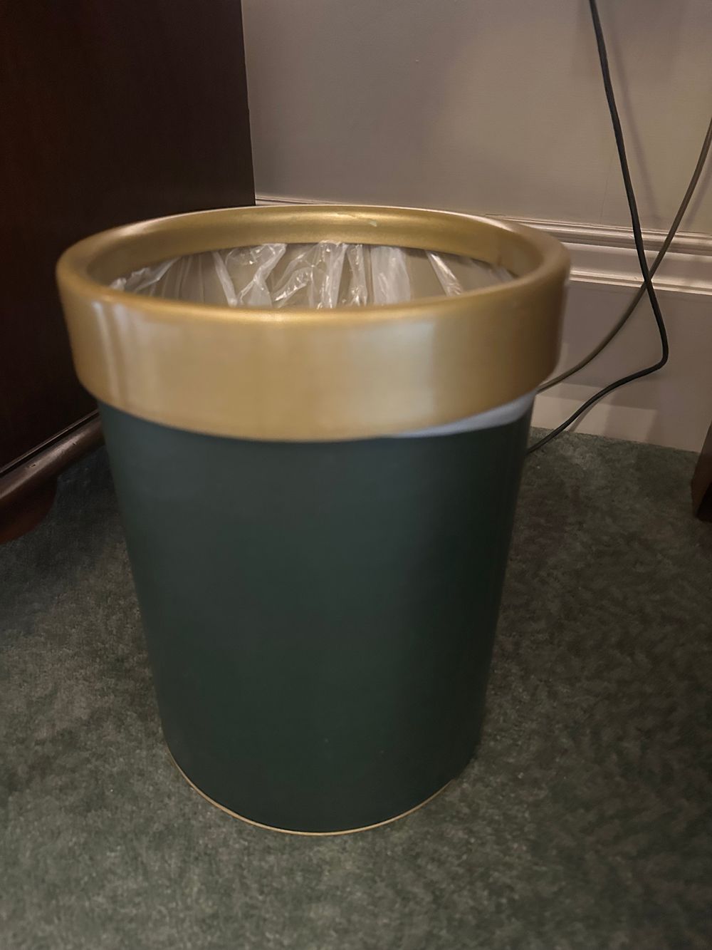 Lot 1225: A Modern Dark Green and Gold-Tone Waste Bin