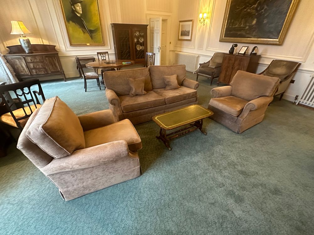 Lot 1228: A Three-Piece Upholstered Seating Suite and a Leather-Inlaid Coffee Table