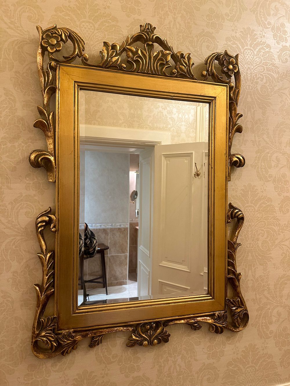 Lot 1233: A Hollywood Regency Baroque Style Gilt Wall Mirror